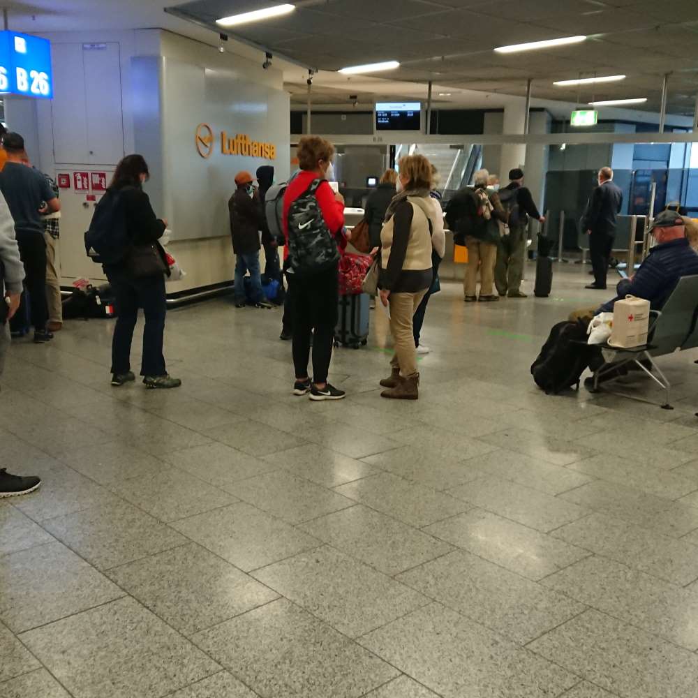 social distancing on the departure gate